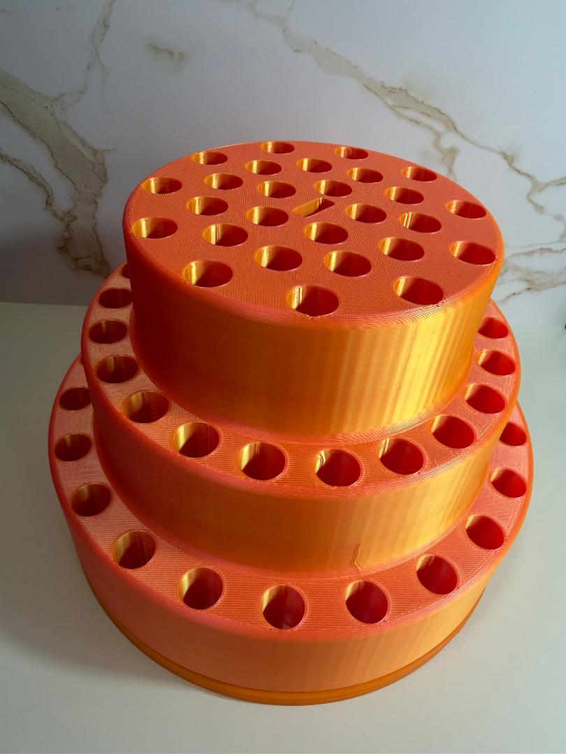 Rotating pen holder